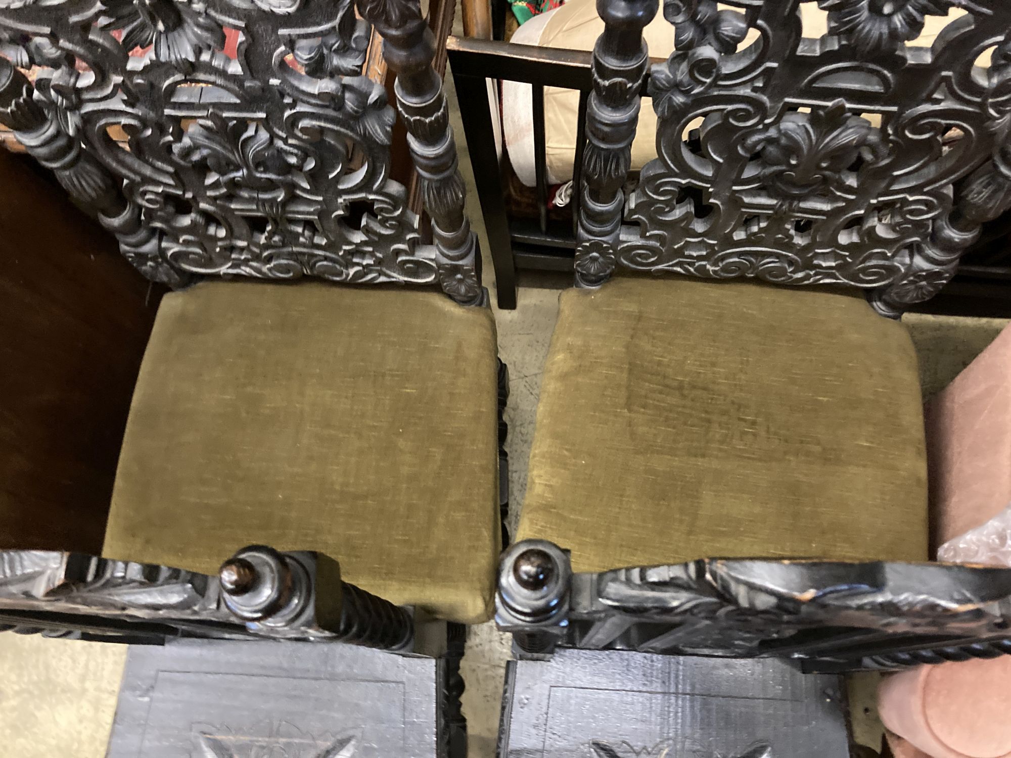 Two pairs of Victorian carved oak dining chairs